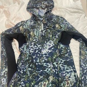 Lululemon lightweight shirt with a hood in like new condition